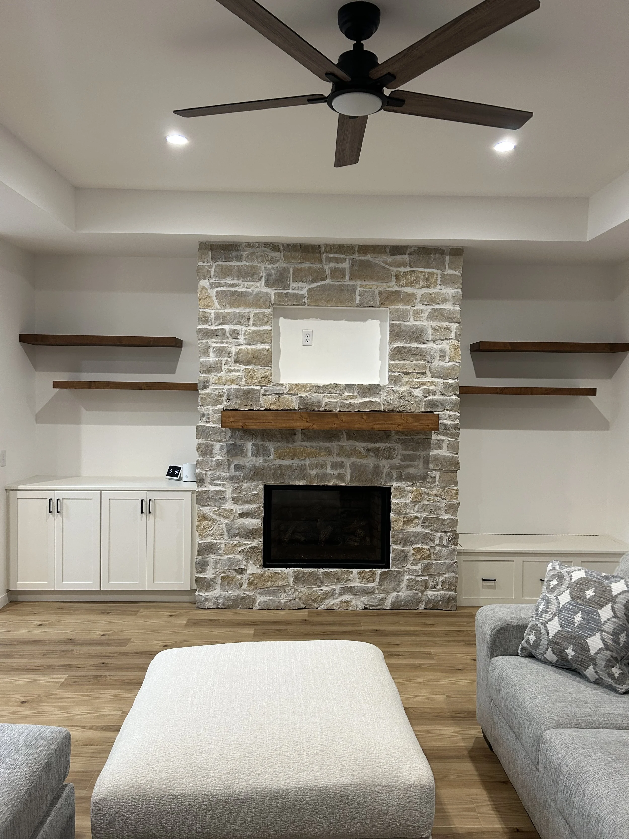 Alder mantle and floating shelves.