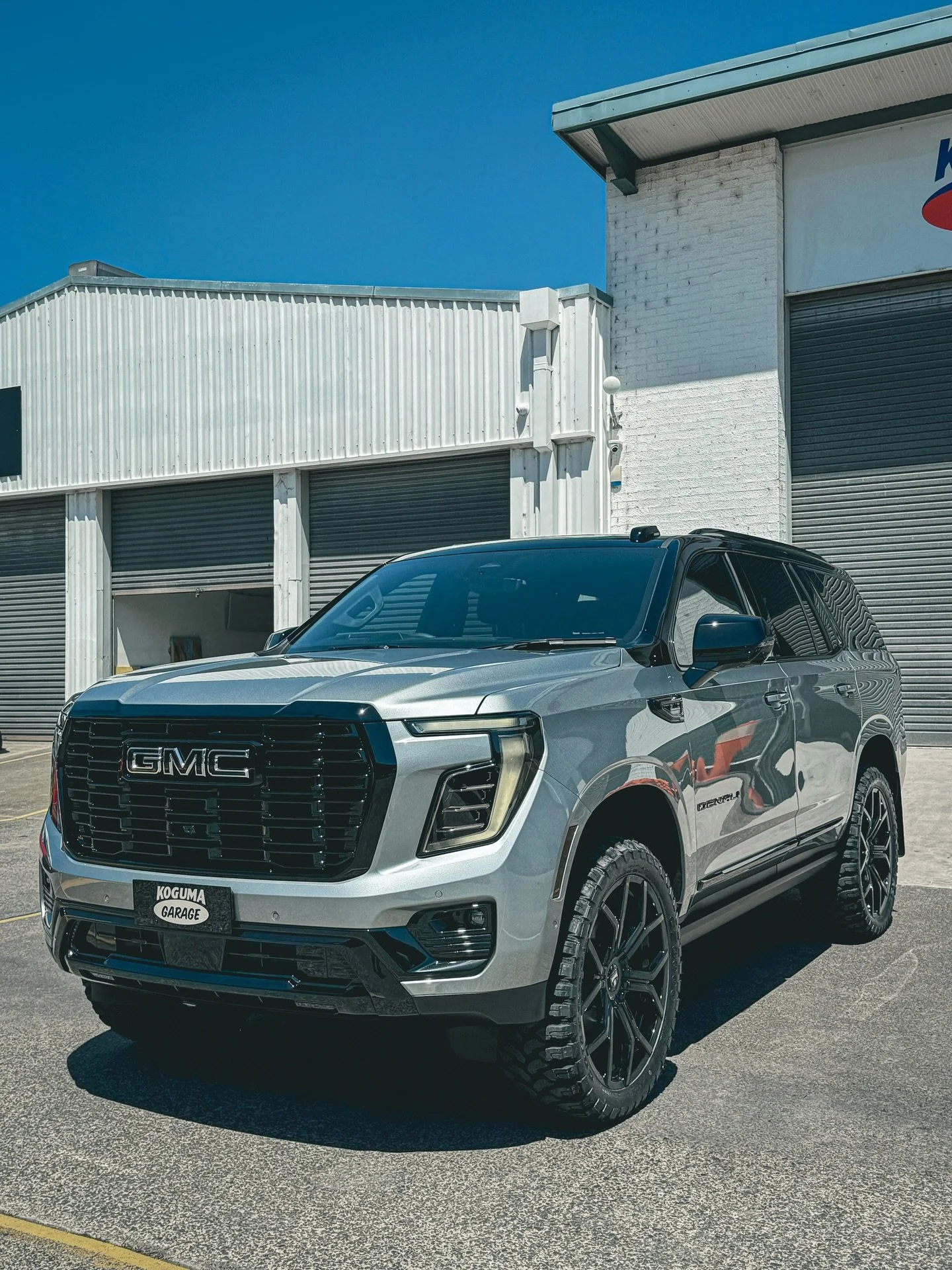 GMC Yukon Denali came to us from the dealership ready for a transformation &mdash; and we delivered.

- Full exterior chrome delete package
- 2-tone gloss black PPF package
- Headlights, tail lights &amp; side markers tinted
- 24&rdquo; Dub Royalty w