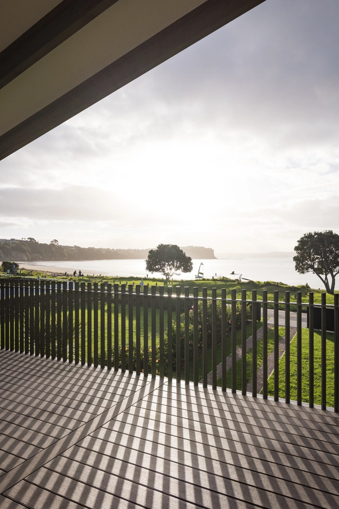 View towards the coast from the home's outdoor deck, including custom aluminium balustrade