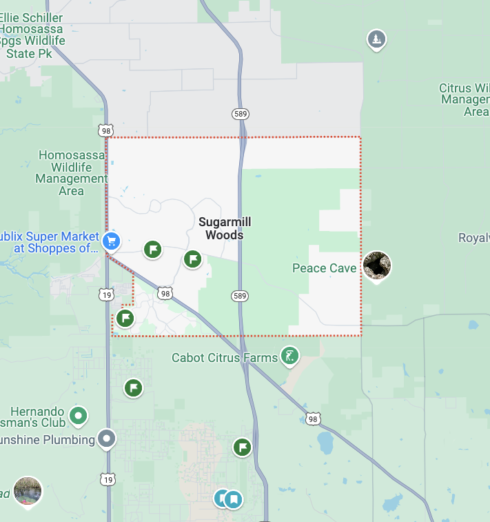 Map of Sugarmill Woods showing nearby landmarks including Citrus Wildlife Management Area, Peace Cave, Cabot Citrus Farms, and Hernando Sportsman's Club, with roads US 98, US 19, and highways 589 and 98.