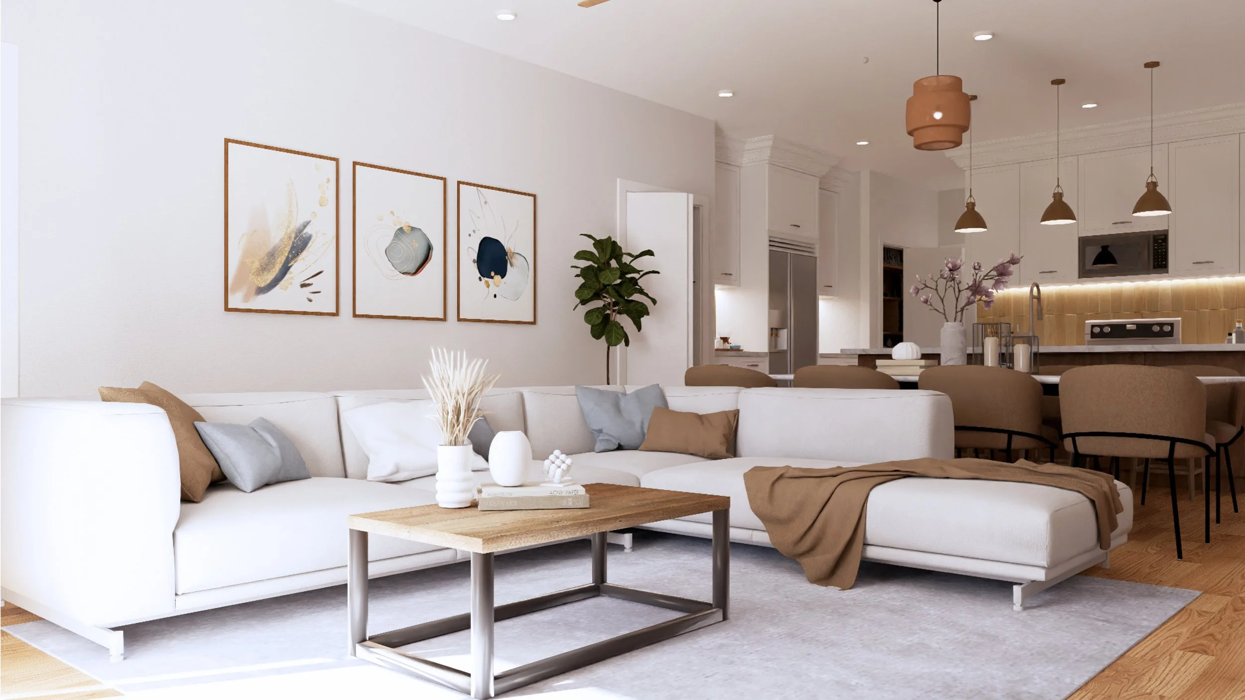 Modern living room with white sofa, beige cushions, and abstract art on the wall, leading to a kitchen area with dining table, pendant lights, and decorative flowers.