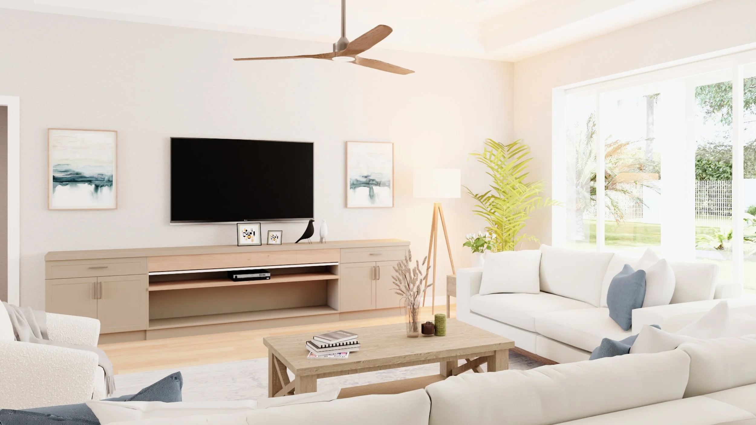 Bright living room with large windows, white sofas with blue and white cushions, wooden coffee table, TV mounted on wall, artwork, potted plant, and wooden ceiling fan.