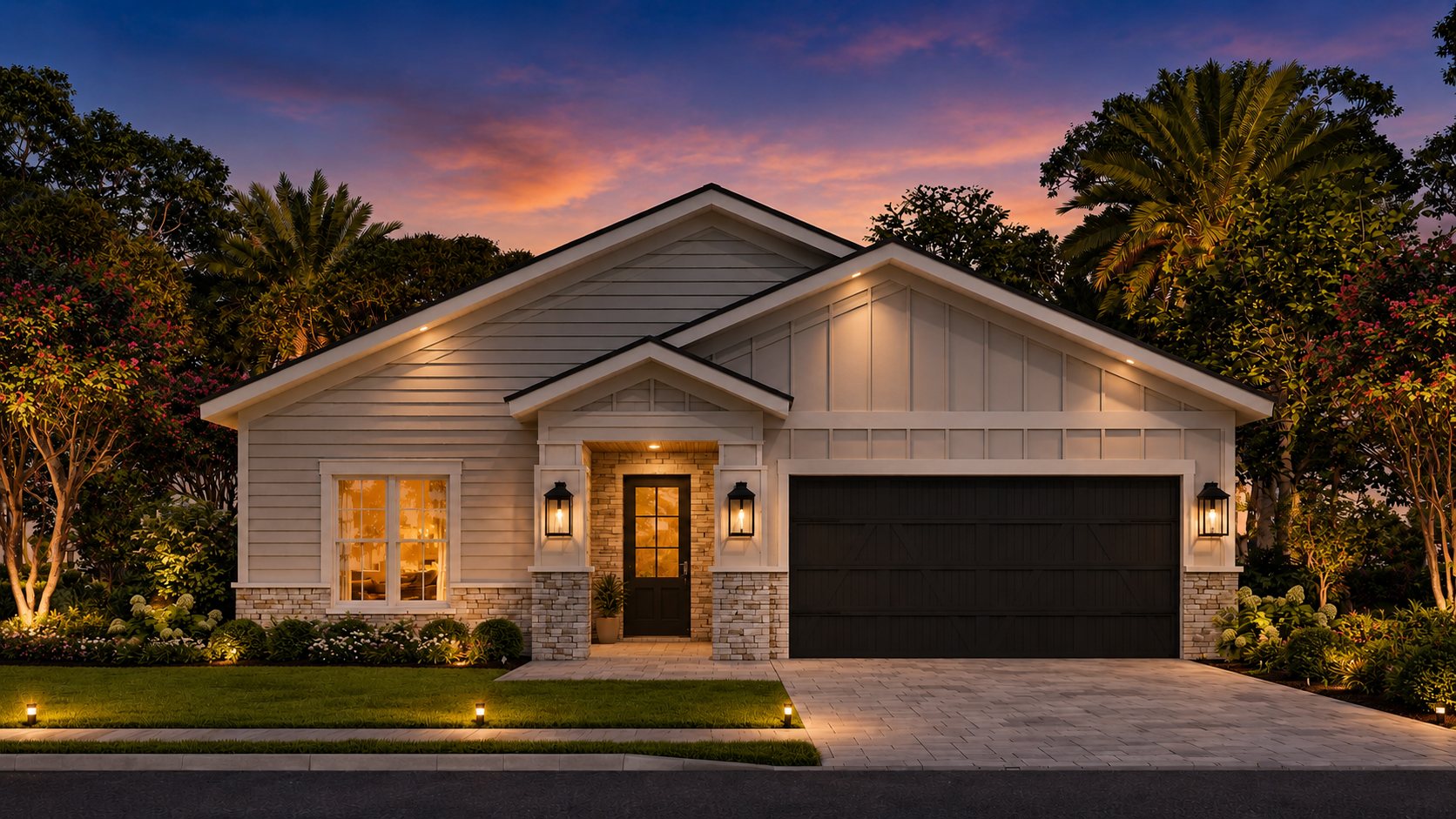 A modern suburban house at dusk with exterior lighting, white siding, brick accents, a dark garage door, landscaped front yard, and trees in the background.