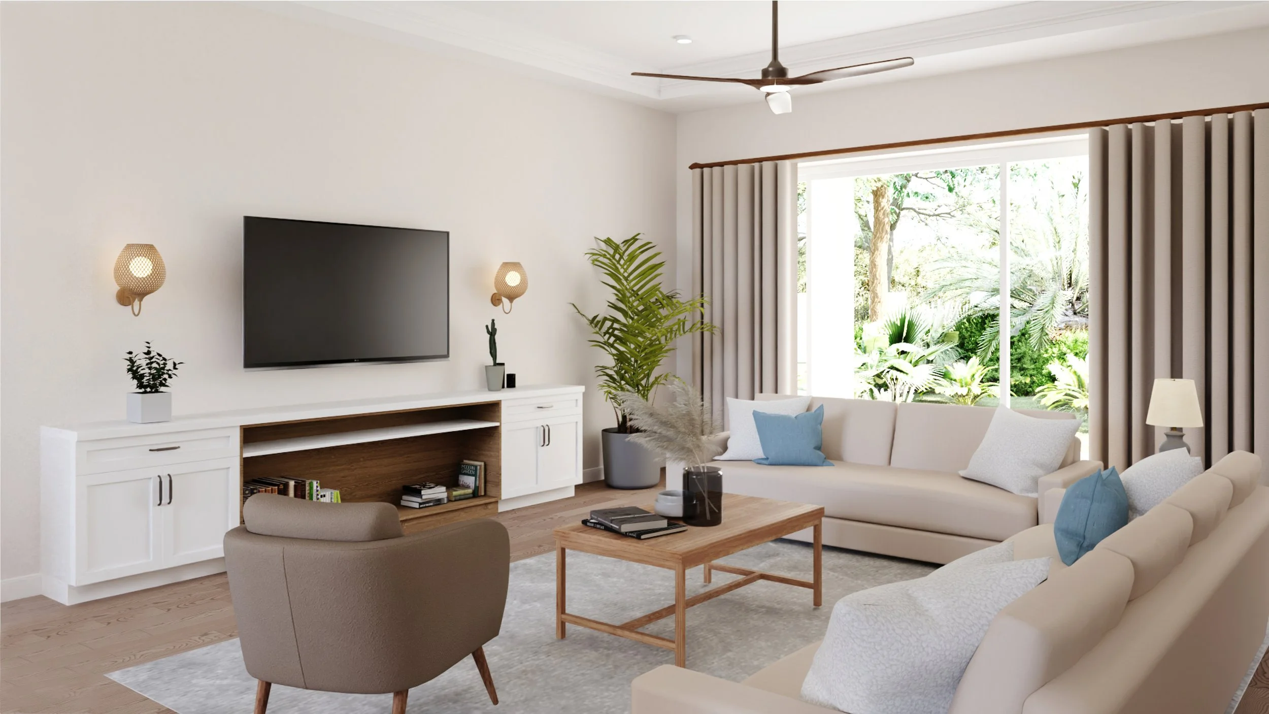 Bright living room with white walls, large window with beige curtains, cream sofas with blue and white pillows, wooden coffee table with vases and books, wall-mounted TV, potted plant, ceiling fan