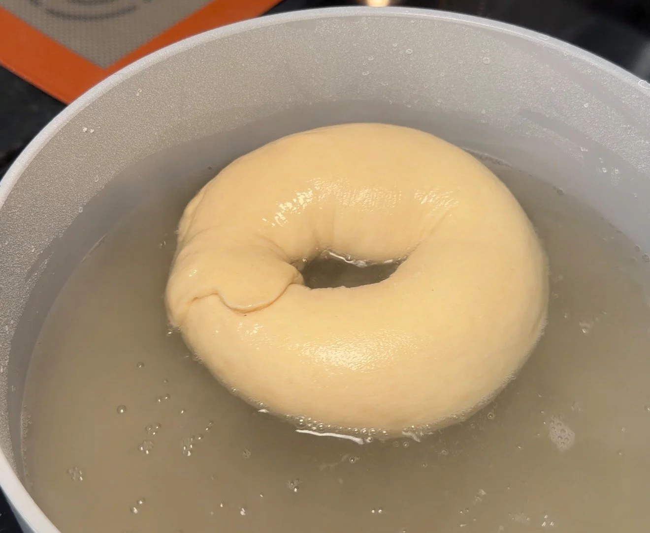 bagel in baking soda bath. 