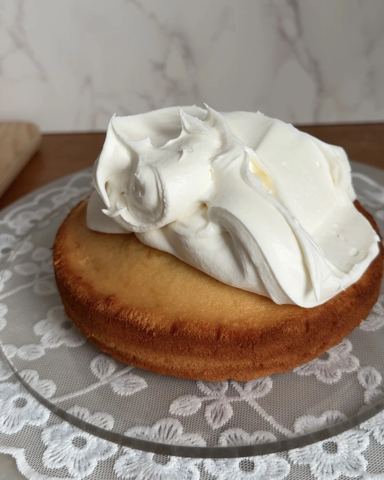 whipped cream piled high on cake