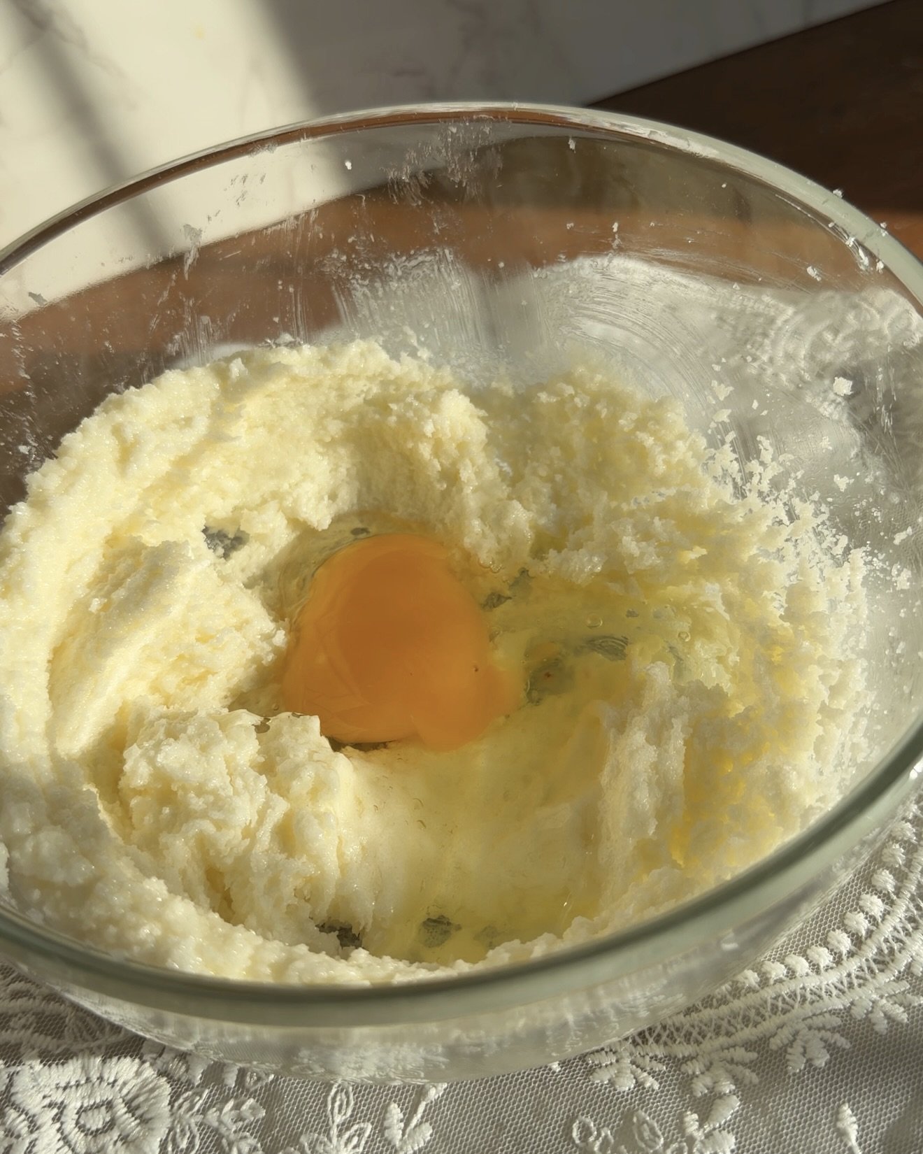 Wet ingredients in a mixing bowl on the counter