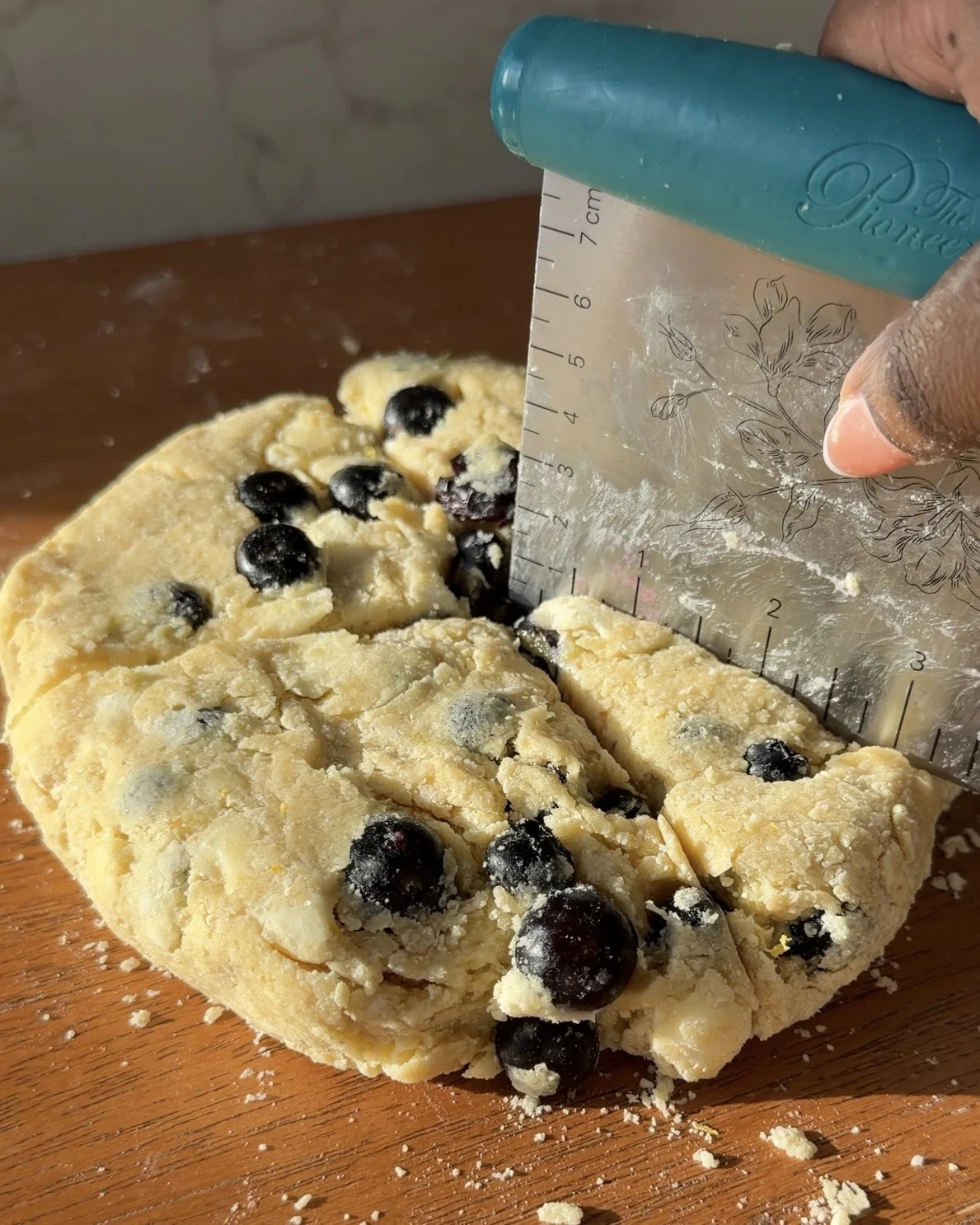 Scone disk being cut into 8 even sections