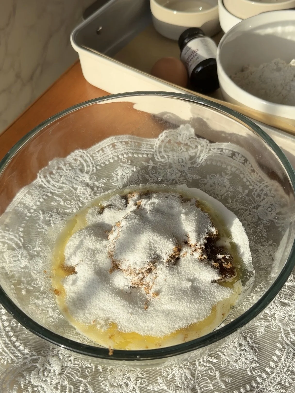 melted butter and sugars in a mixing bowl