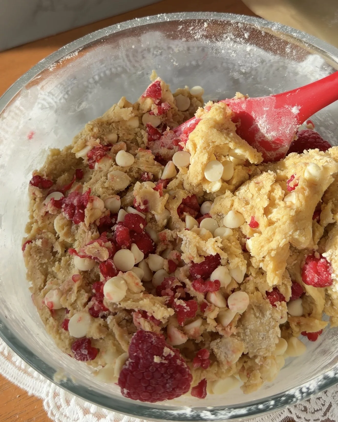 Raspberry and white chocolate chips added to cookie dough.