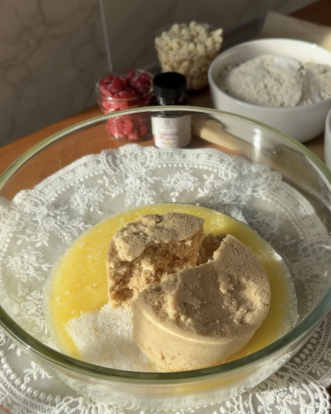 melted butter, granulated sugar, and brown sugar in mixing bowl.
