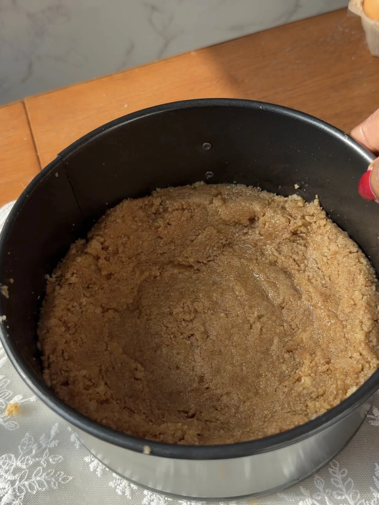 Graham cracker crust pressed into a 6 inch spring form