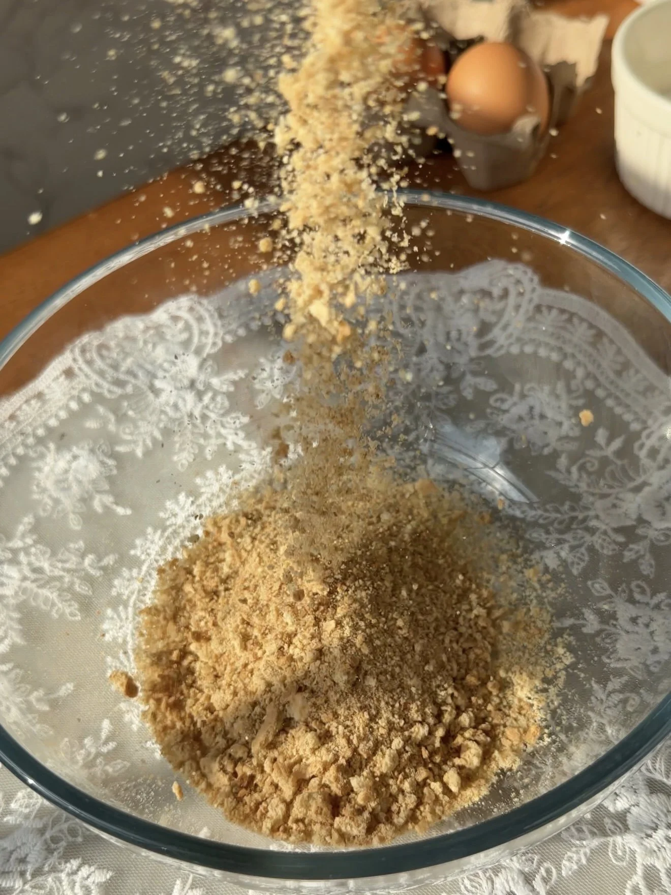 Graham crackers crushed into a bowl