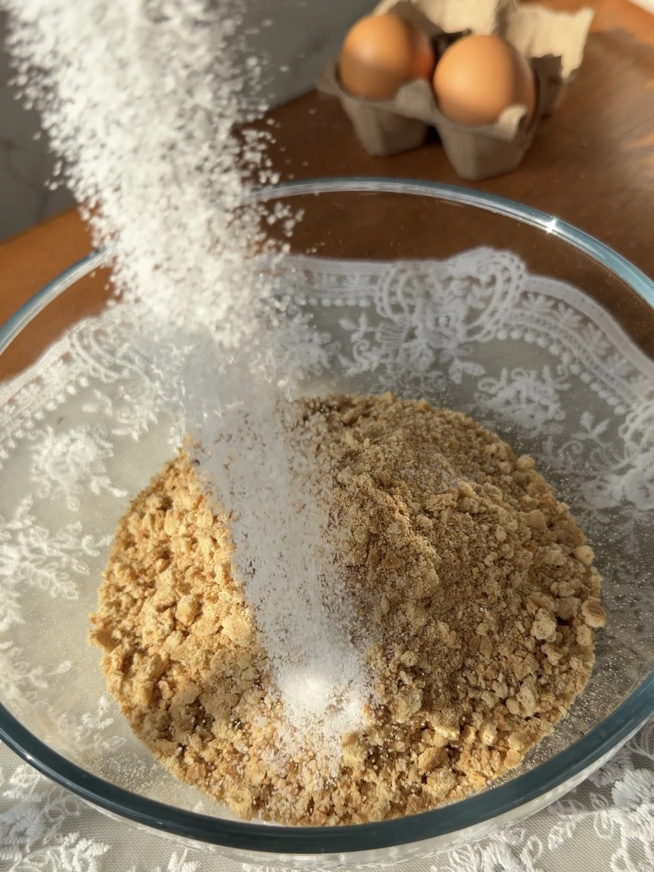 Add granulated sugar to the graham crackers