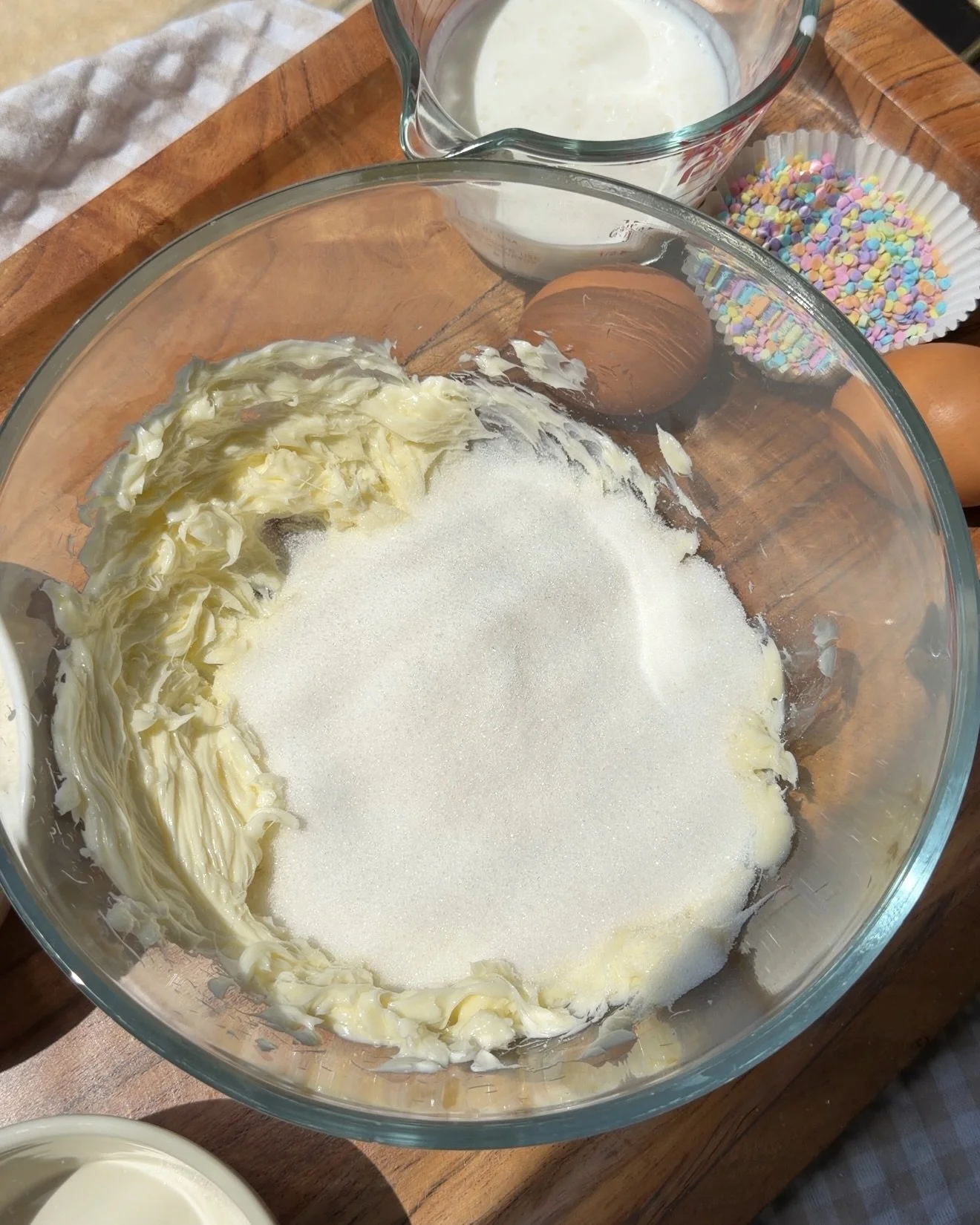 butter and sugar in glass mixing bowl on the counter (Copy)