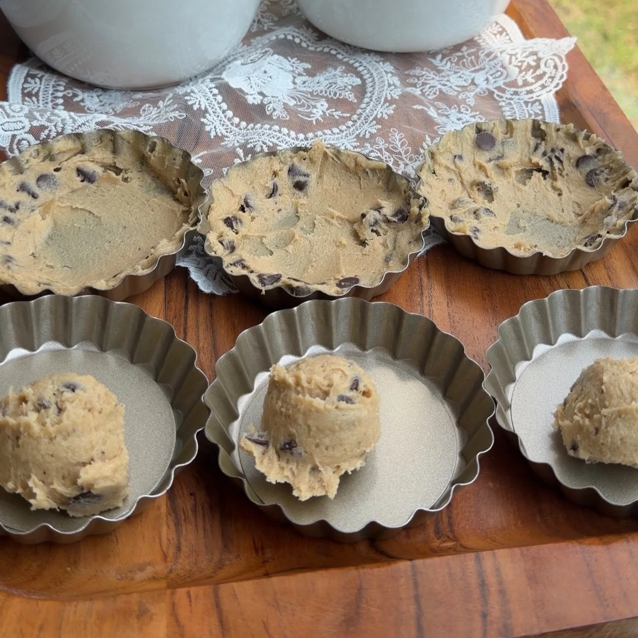 cookie dough scoops in mini tarts. 