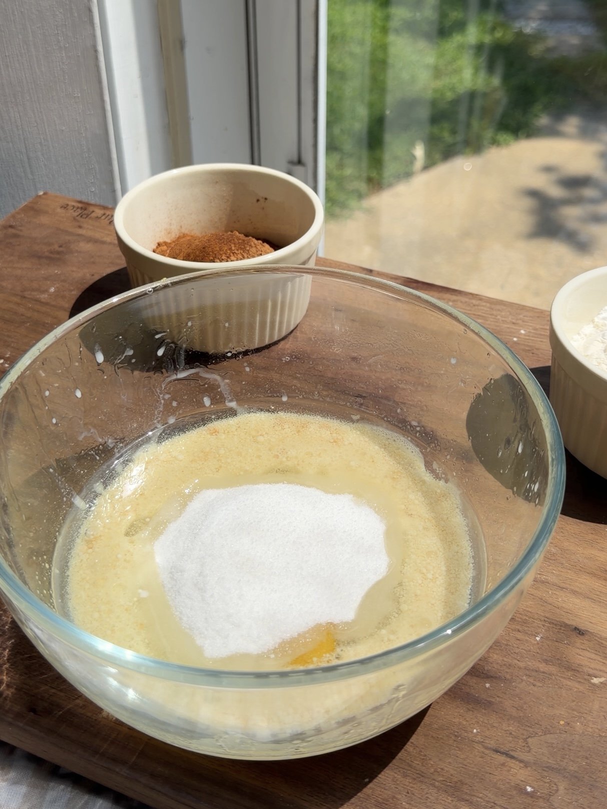 Chocolate cake batter being mixed in a bowl before baking