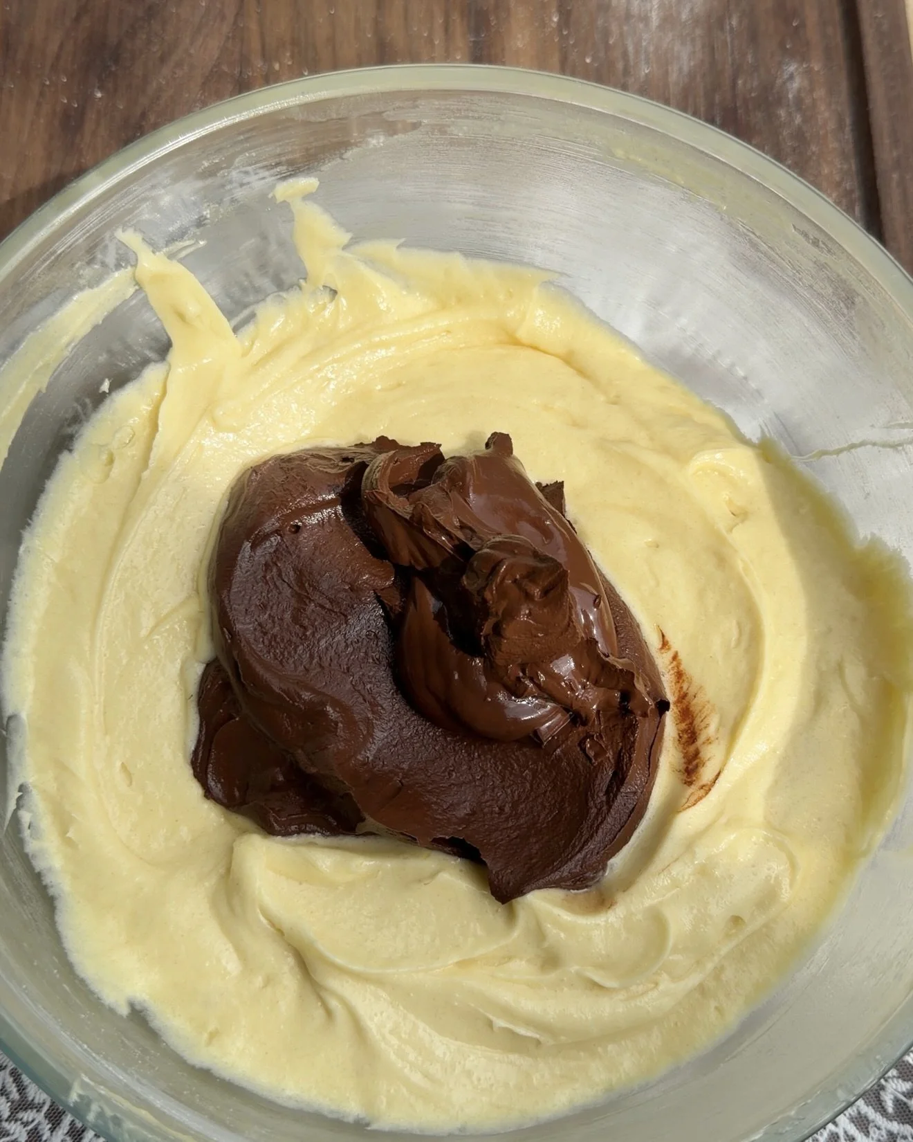 Bloomed cocoa mixture added to cake batter. 