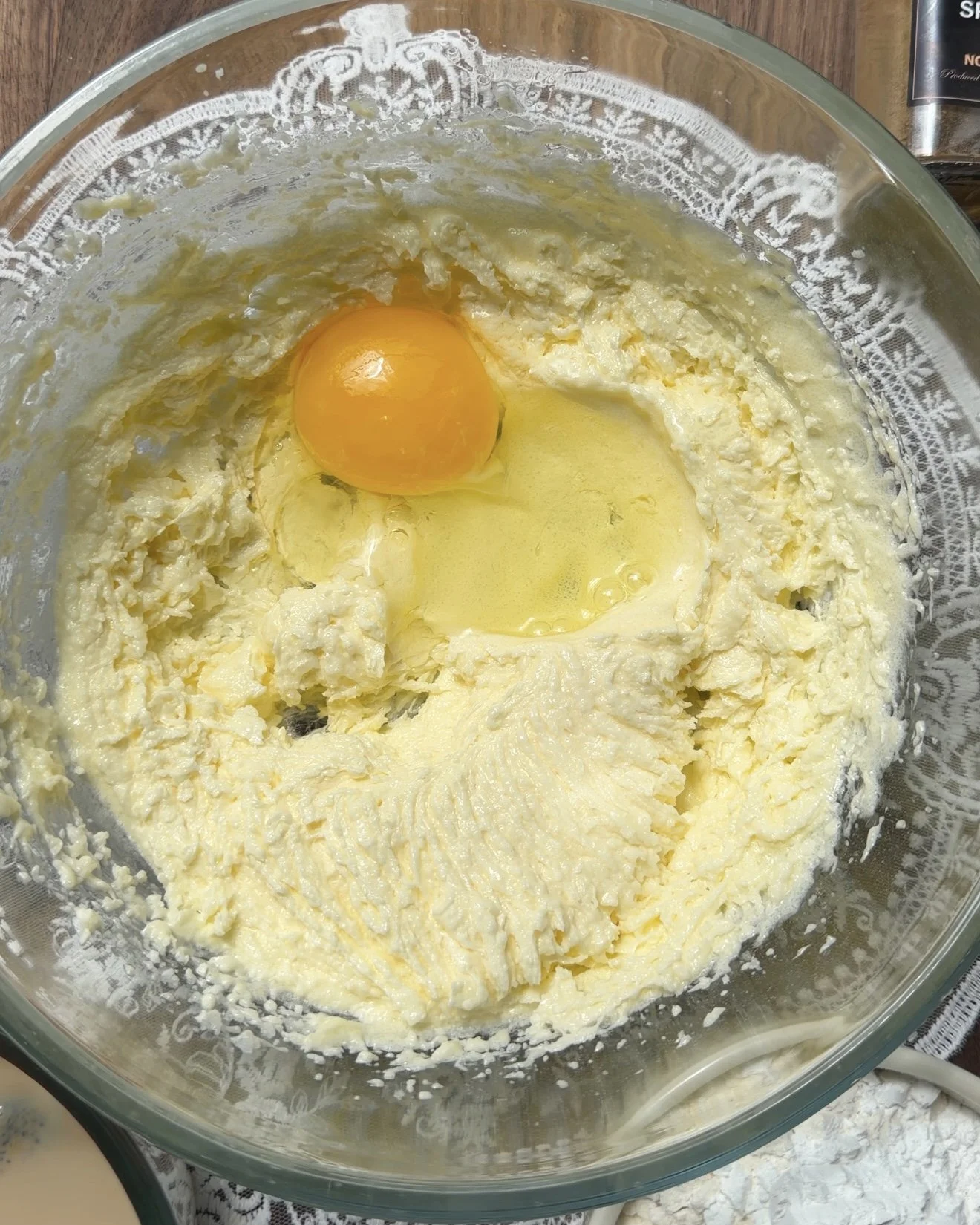 Glass mixing bowl with wet ingredients. 