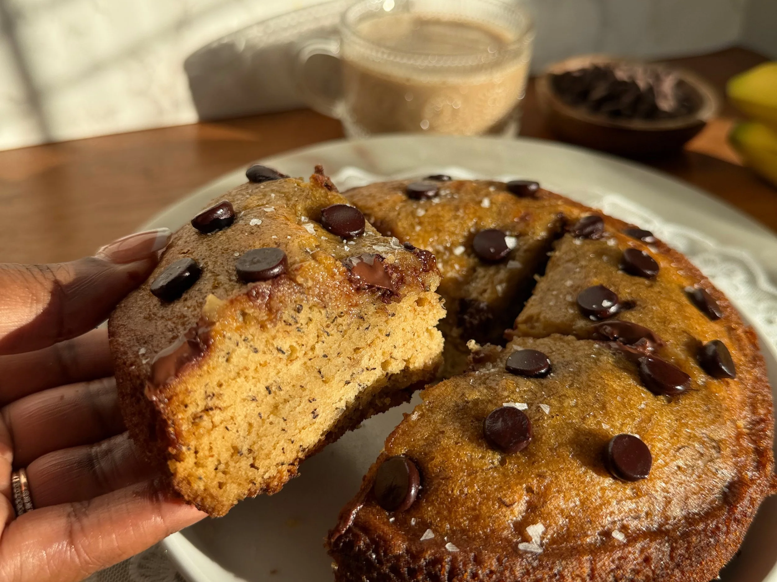 Single serve banana bread sliced and served warm