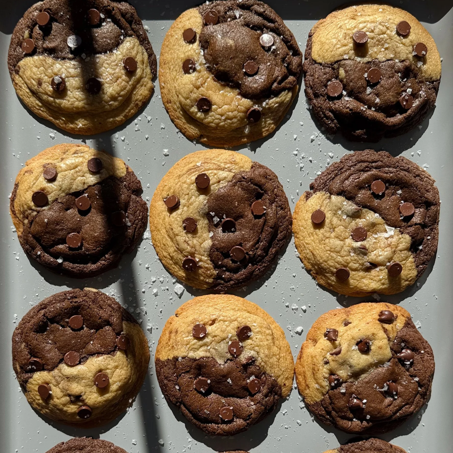 Freshly baked brookie cookies on baking sheet