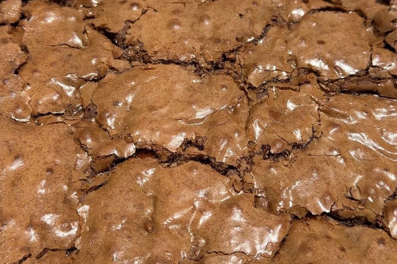 Close up of crinkled brownie tops after baking