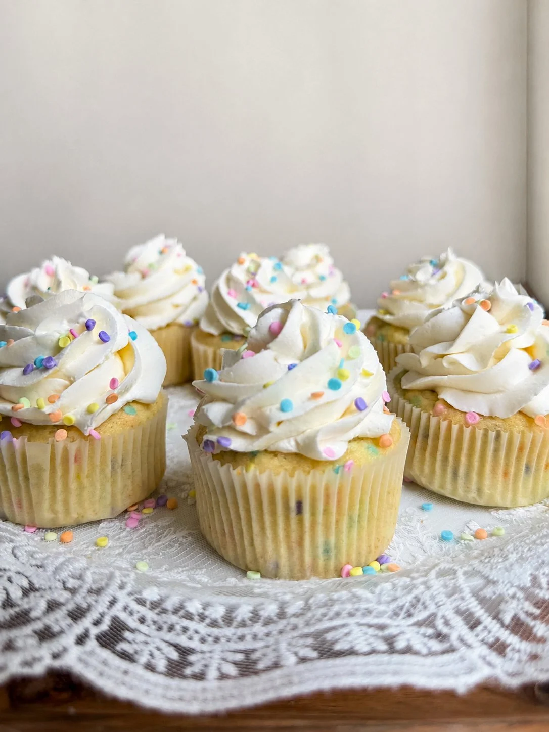 Funfetti cupcakes on white plate