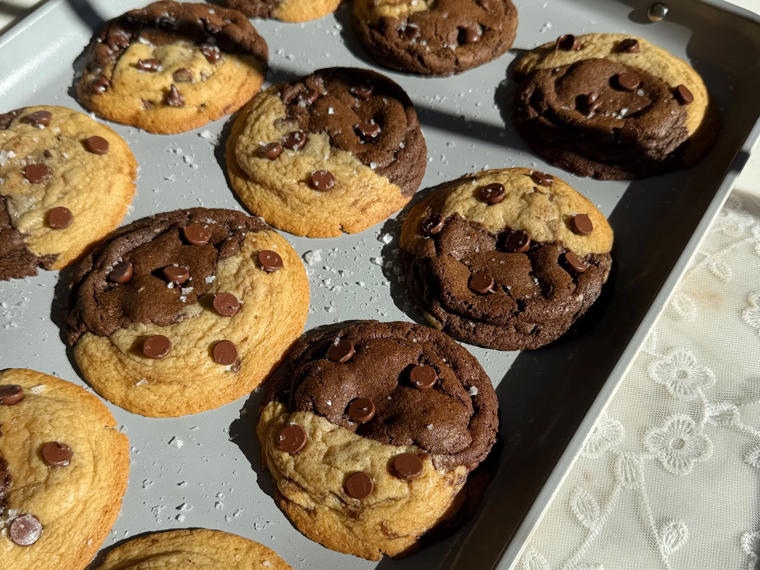 Freshly baked brookie cookies on baking sheet