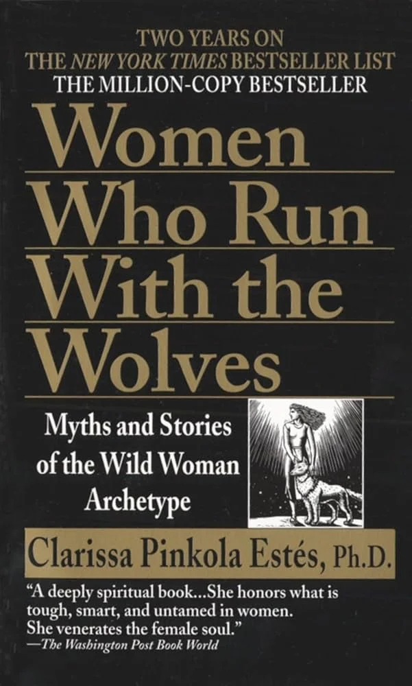 Book cover titled 'Women Who Run With the Wolves: Myths and Stories of the Wild Woman Archetype' by Clarissa Pinkola Estés, Ph.D. It features a black background with gold and white text, and a black-and-white illustration of a woman with long flowing