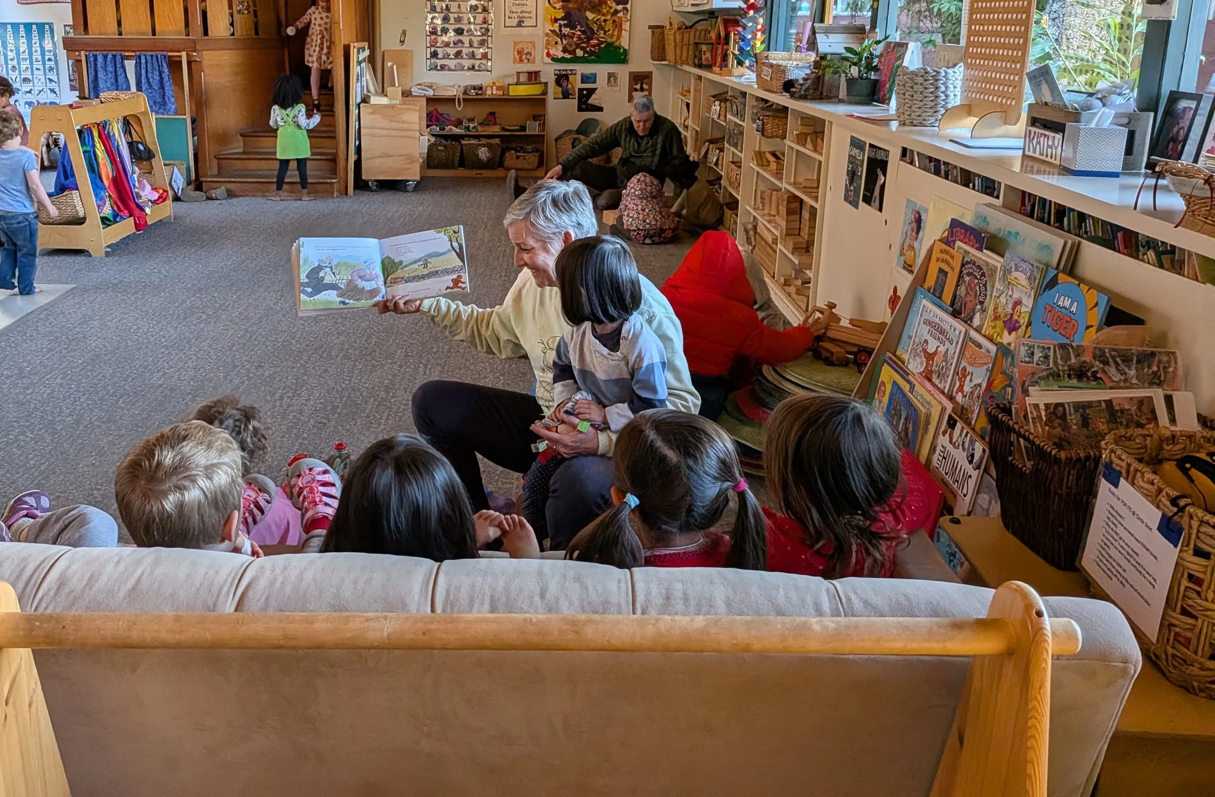 Teacher Allyssa reads a book