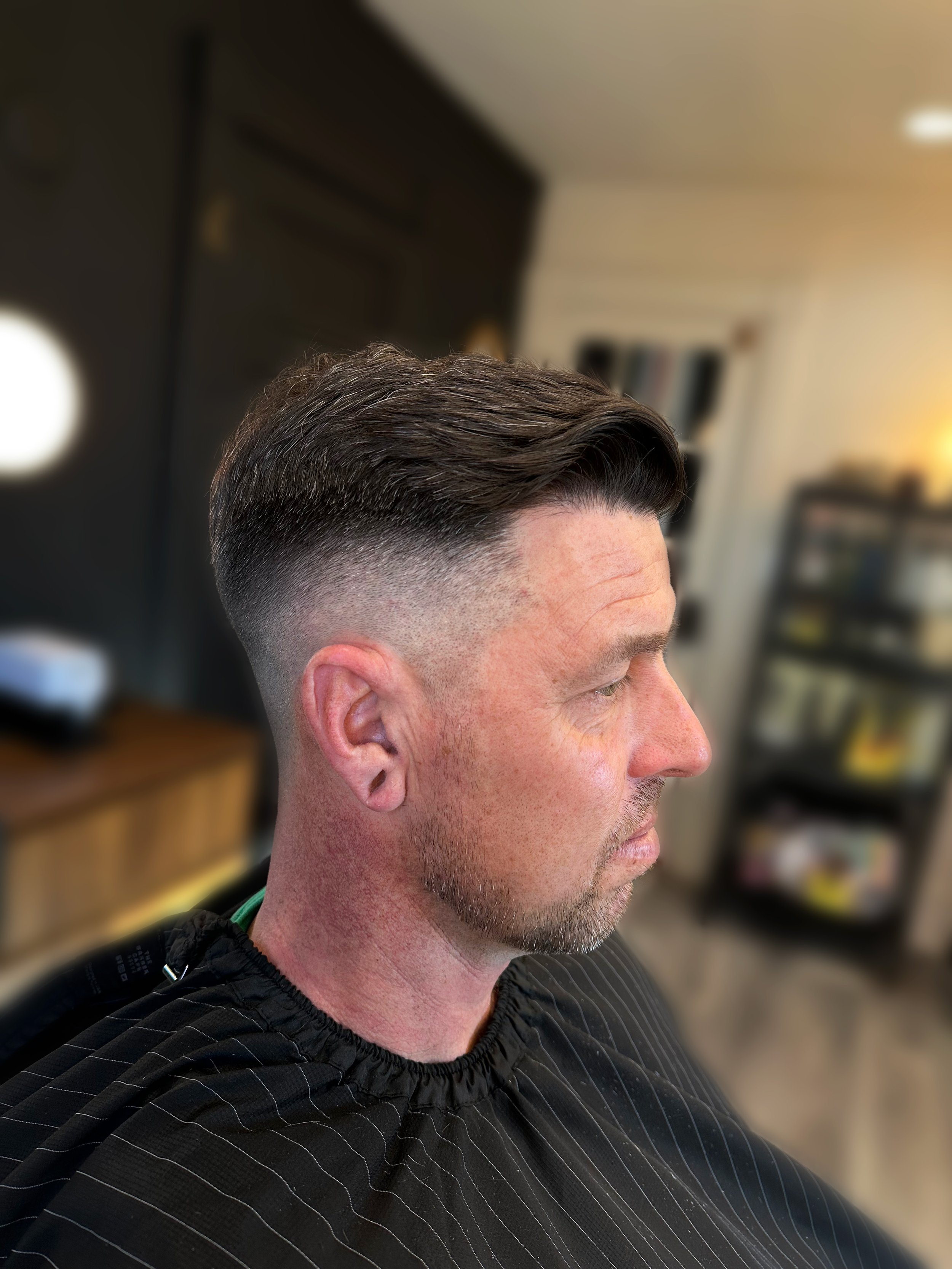 Jeff A brushback fade haircut.jpg