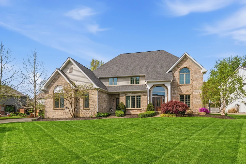 Brick home photographed from the front to show its exterior and curb appeal