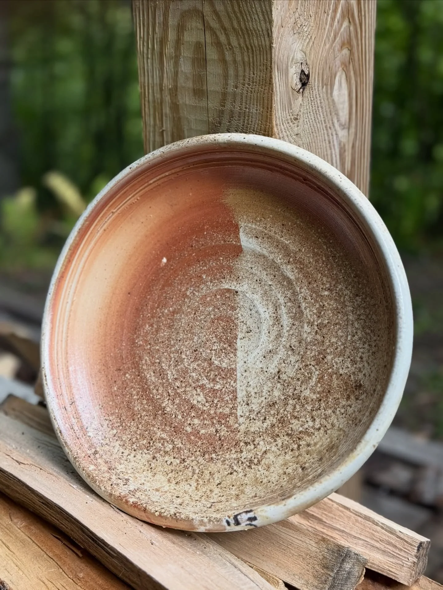 Plates are often tricky to fire—they warp and crack easily. There’s a sense of gratitude when a few make it out intact, but also when they capture the effect of the fire so beautifully.