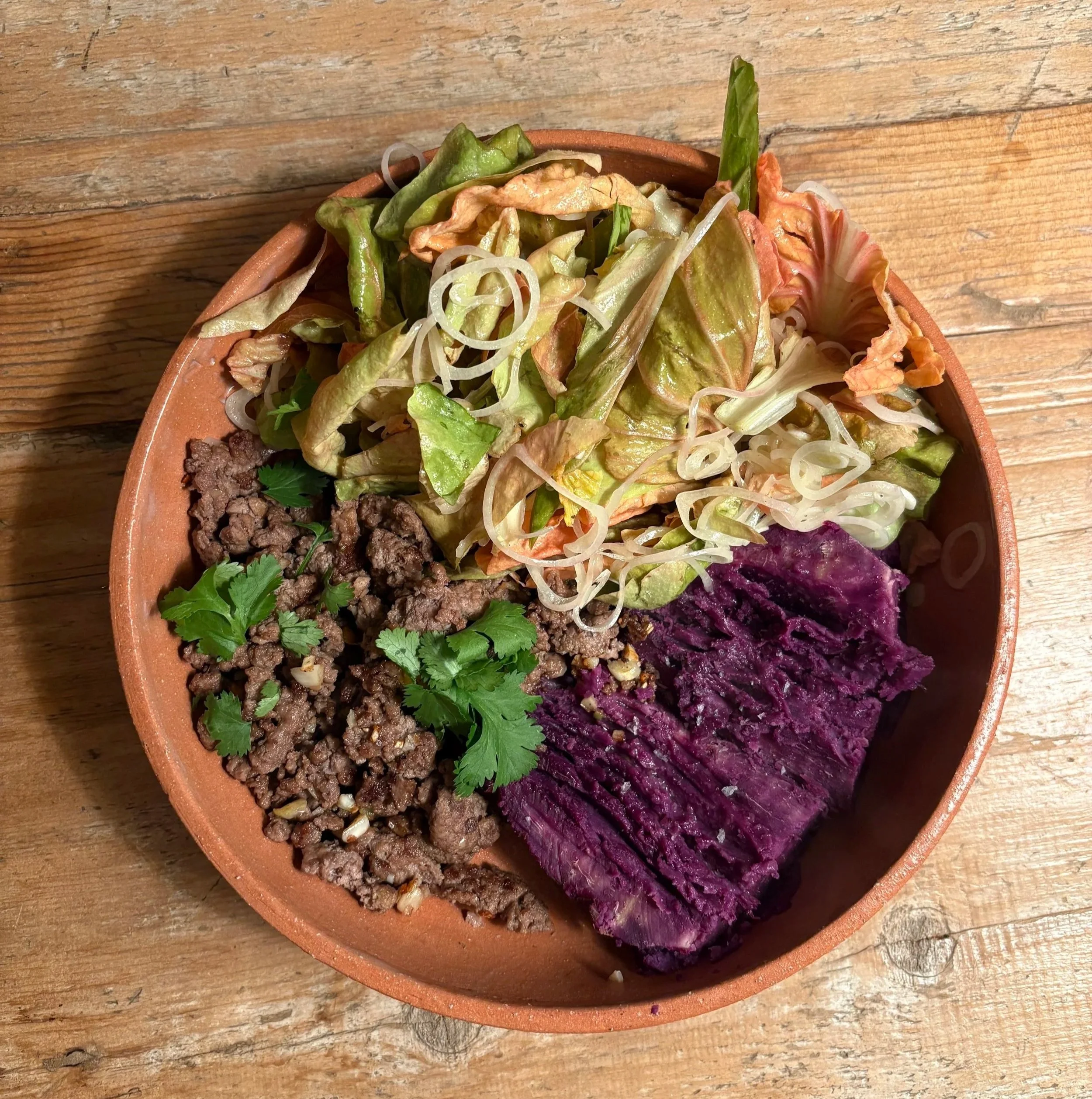 sautéed beef, pink radicchio salad, purple sweet potato 