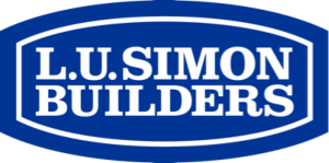 L.U. Simon Builders logo in blue and white