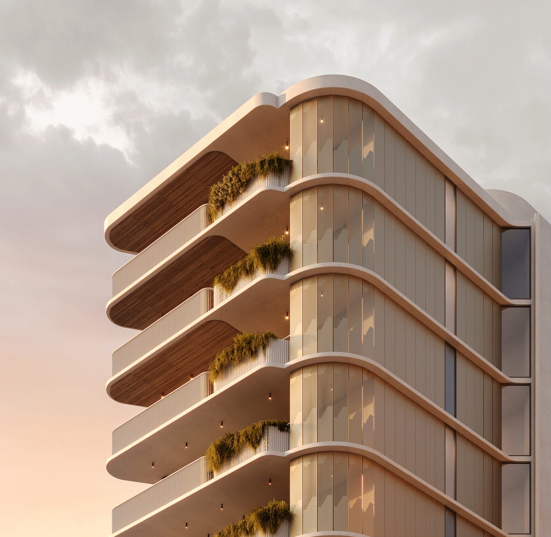 Modern multi-story apartment building with curved balconies, glass walls, and non-combustibile GRC balcony planters.