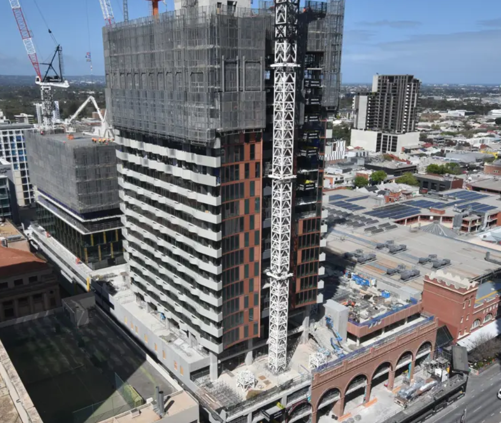 Construction of a high-rise building showcasing GRC architectural features from Satu Bumi.
