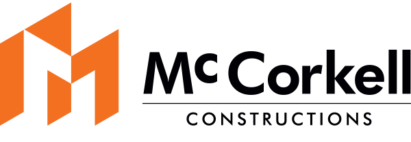 McCorkell Constructions logo with orange geometric design and black text.