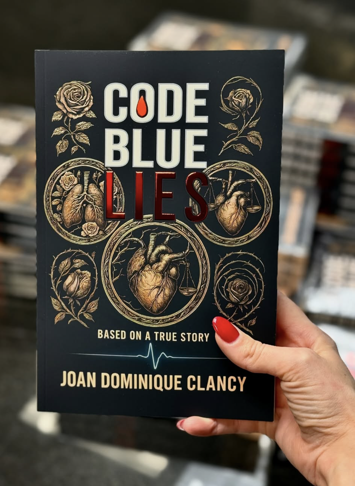 Cover of a book titled 'Code Blue Lies' by Joan Dominique Clancy, with illustrations of anatomical hearts and flowers on a dark background.