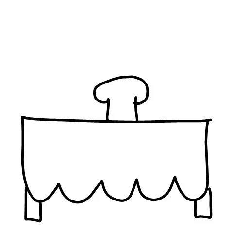 Short chef checking on a table