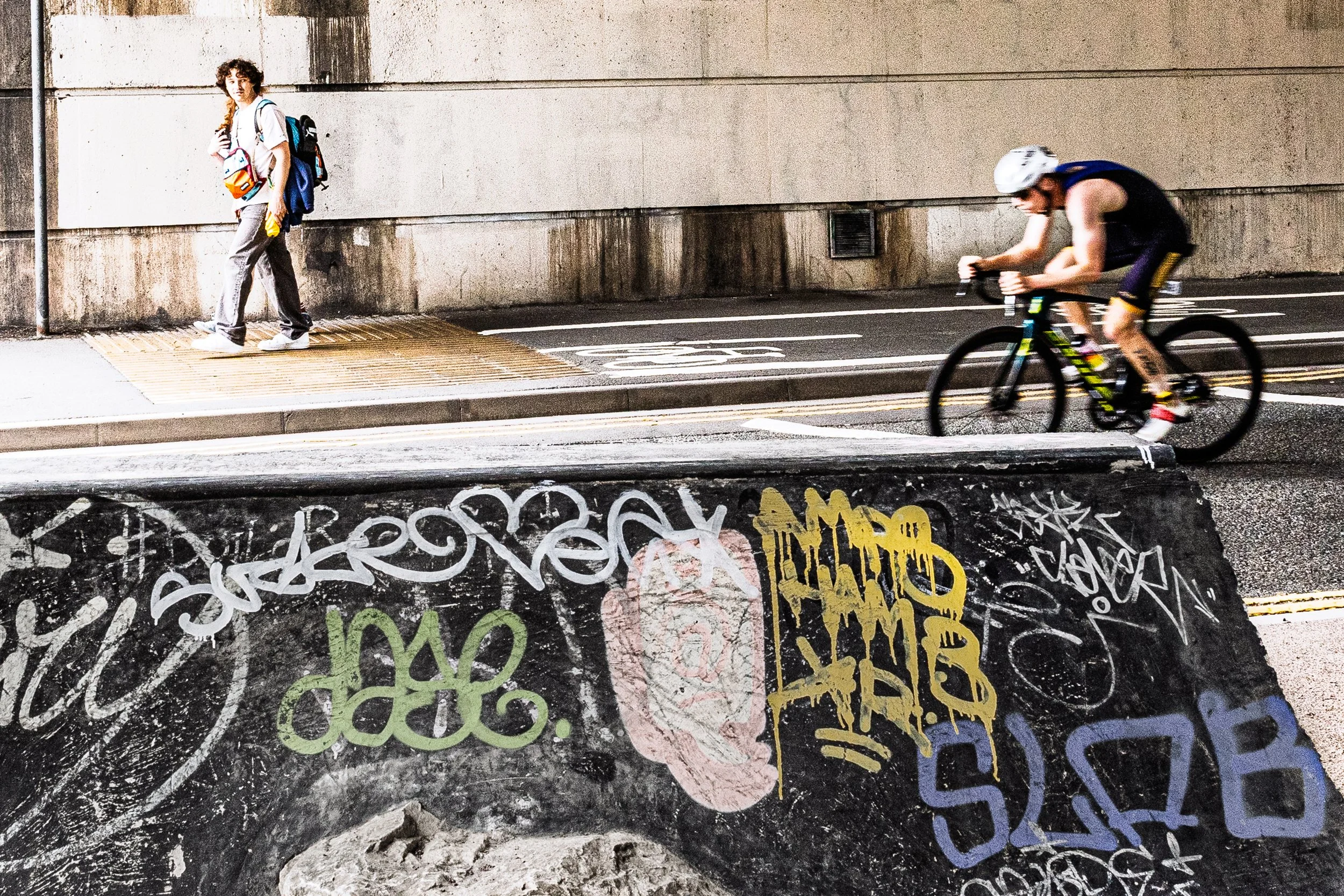 Triathlete races through urban tunnel at the Bristol leg of the British Triathlon Super Tri Series