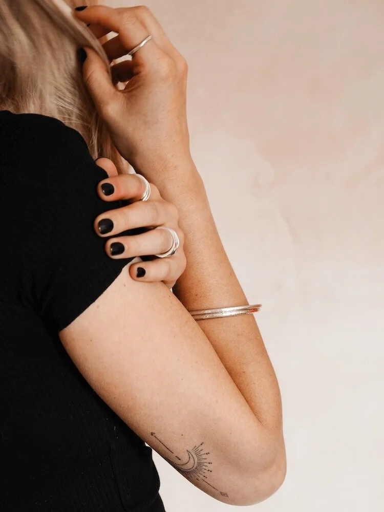 Round hammered Sterling Silver bangle modelled
