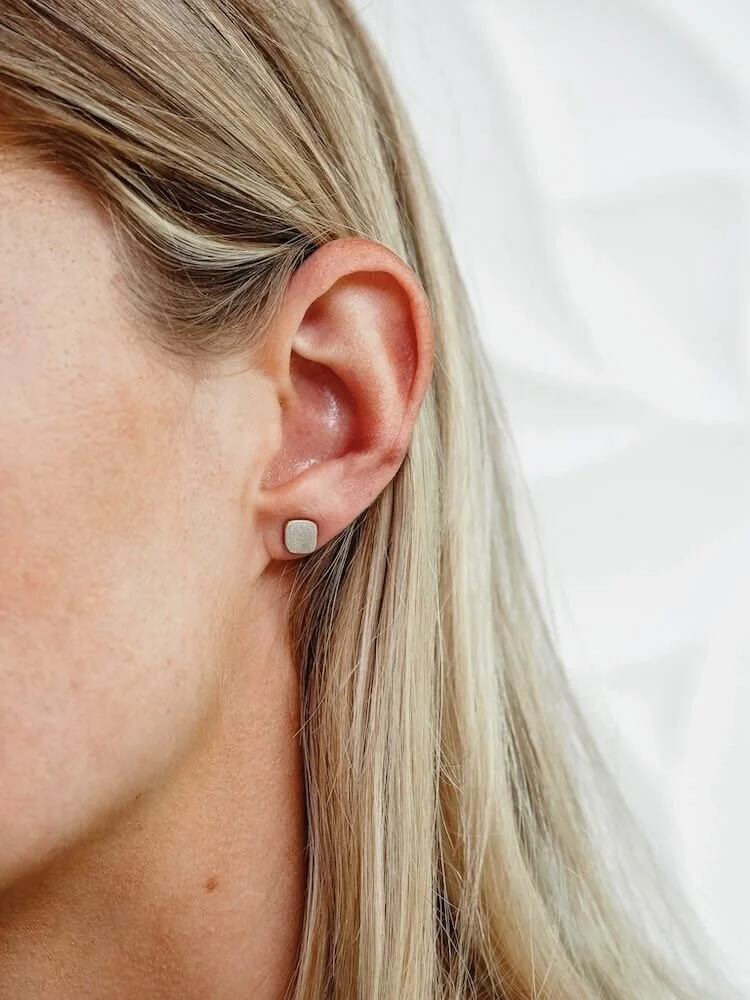Sterling Silver contemporary stud earrings - squares modelled