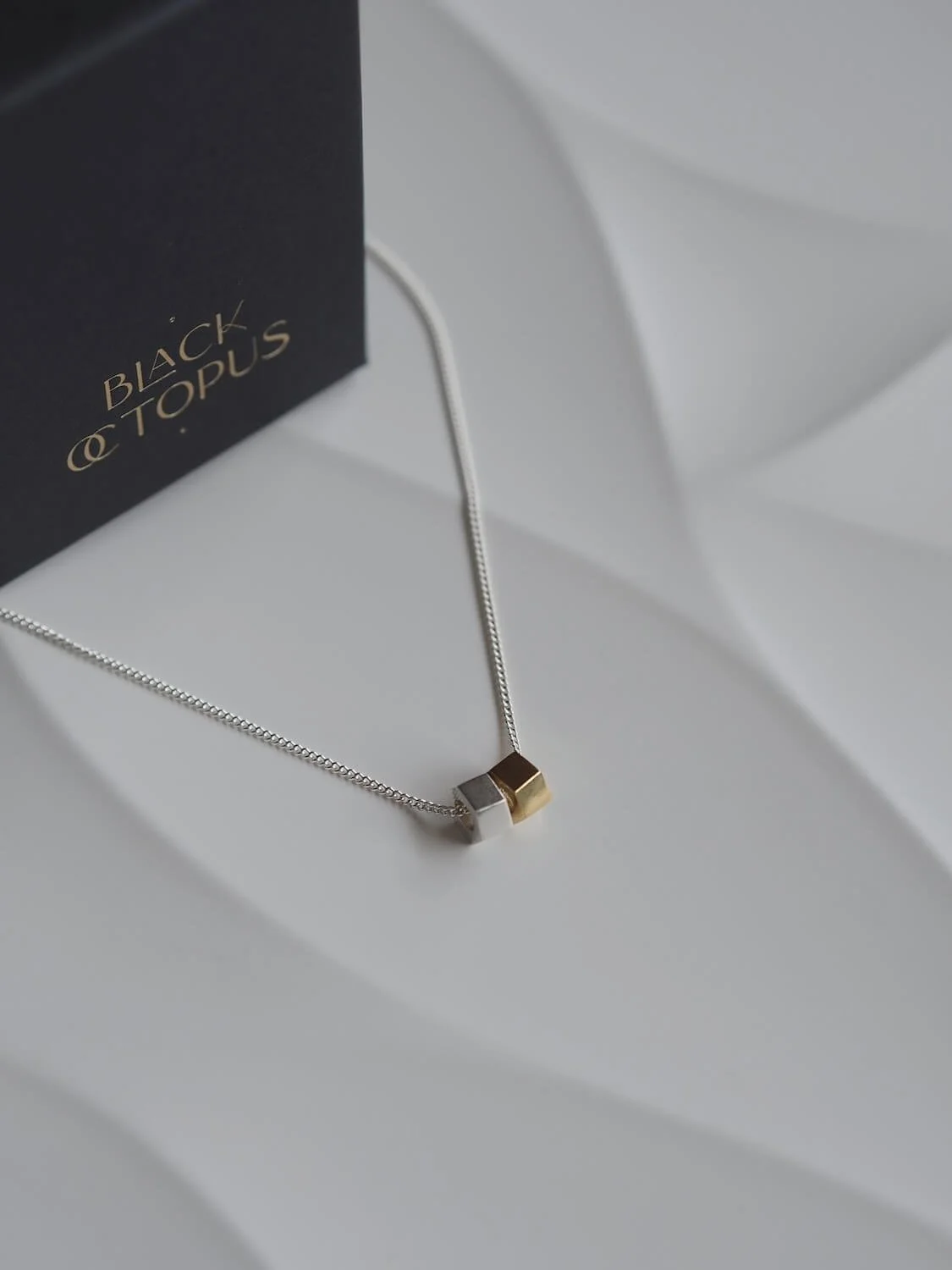 Mixed metal minimalist hexagon pendant