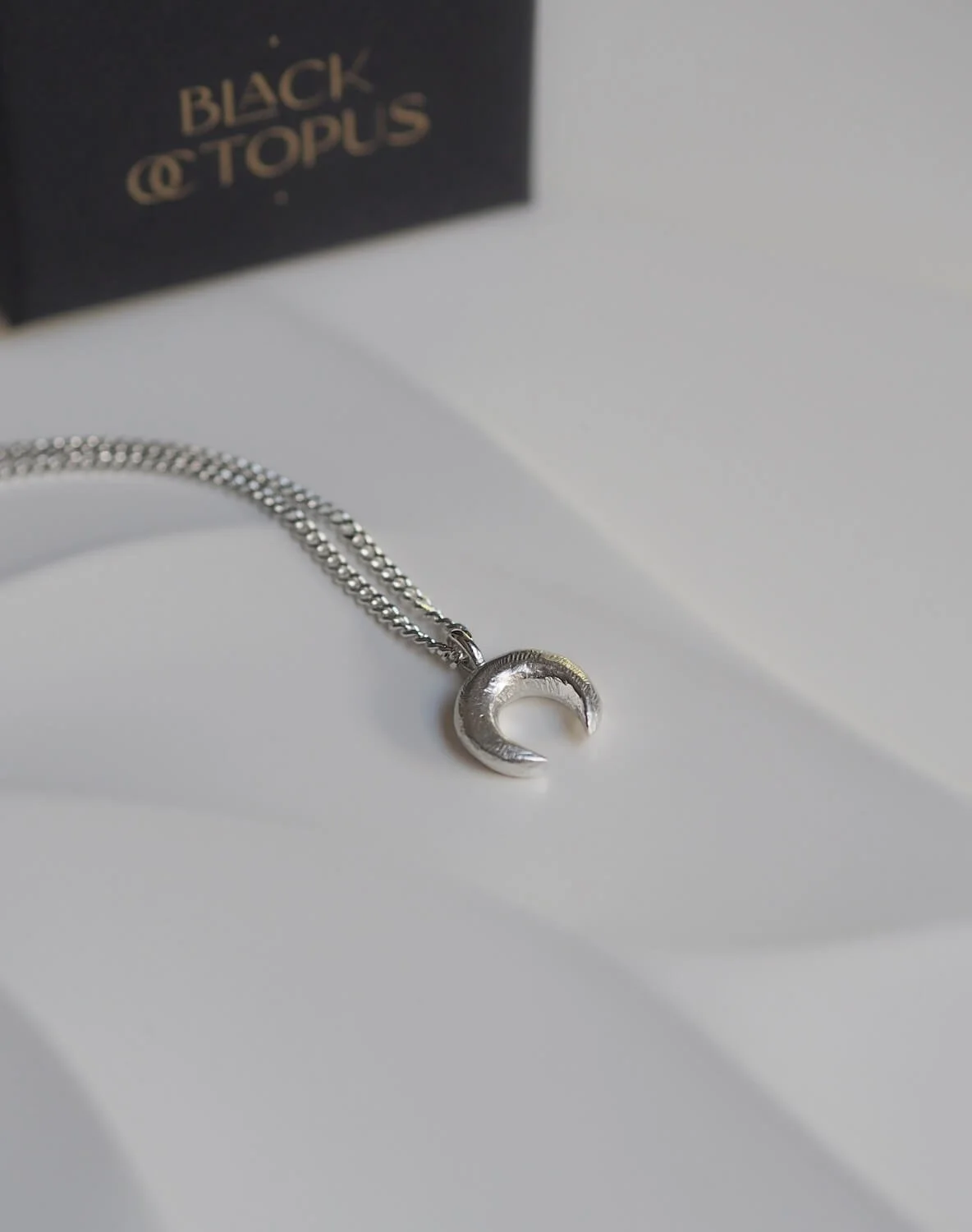 Silver organic crescent moon pendant