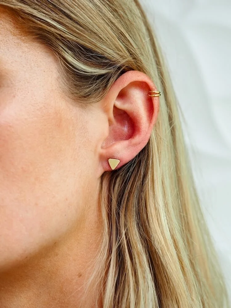 Gold Vermeil contemporary stud earrings - triangles modelled