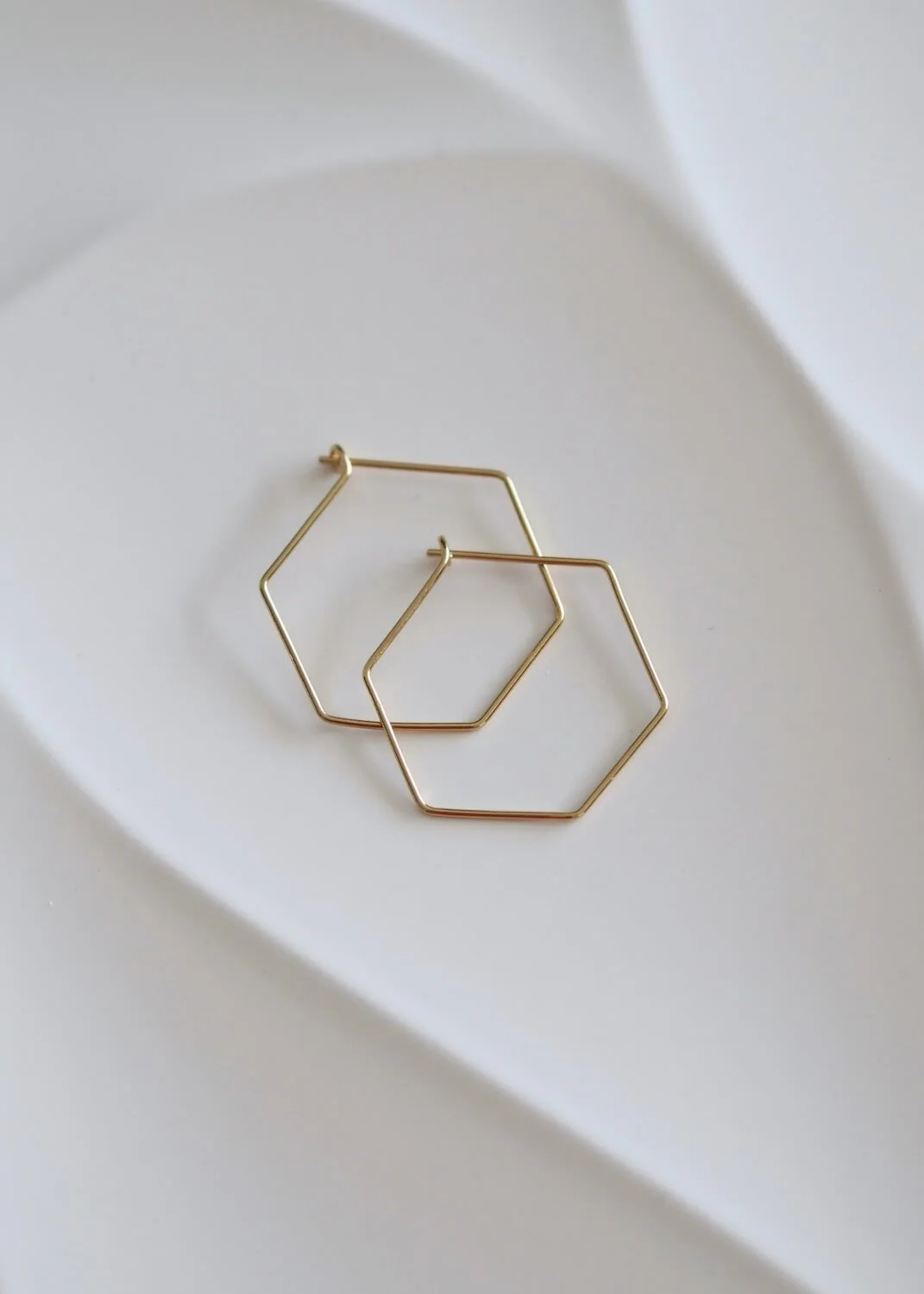 Gold hexagon hoop earrings