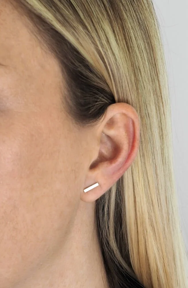 Sterling Silver square bar stud earrings modelled