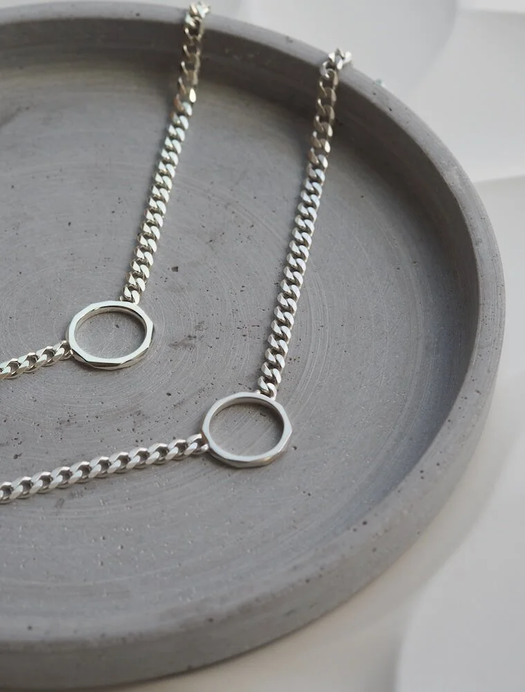 Alternative sterling silver curb chain necklace with central ring