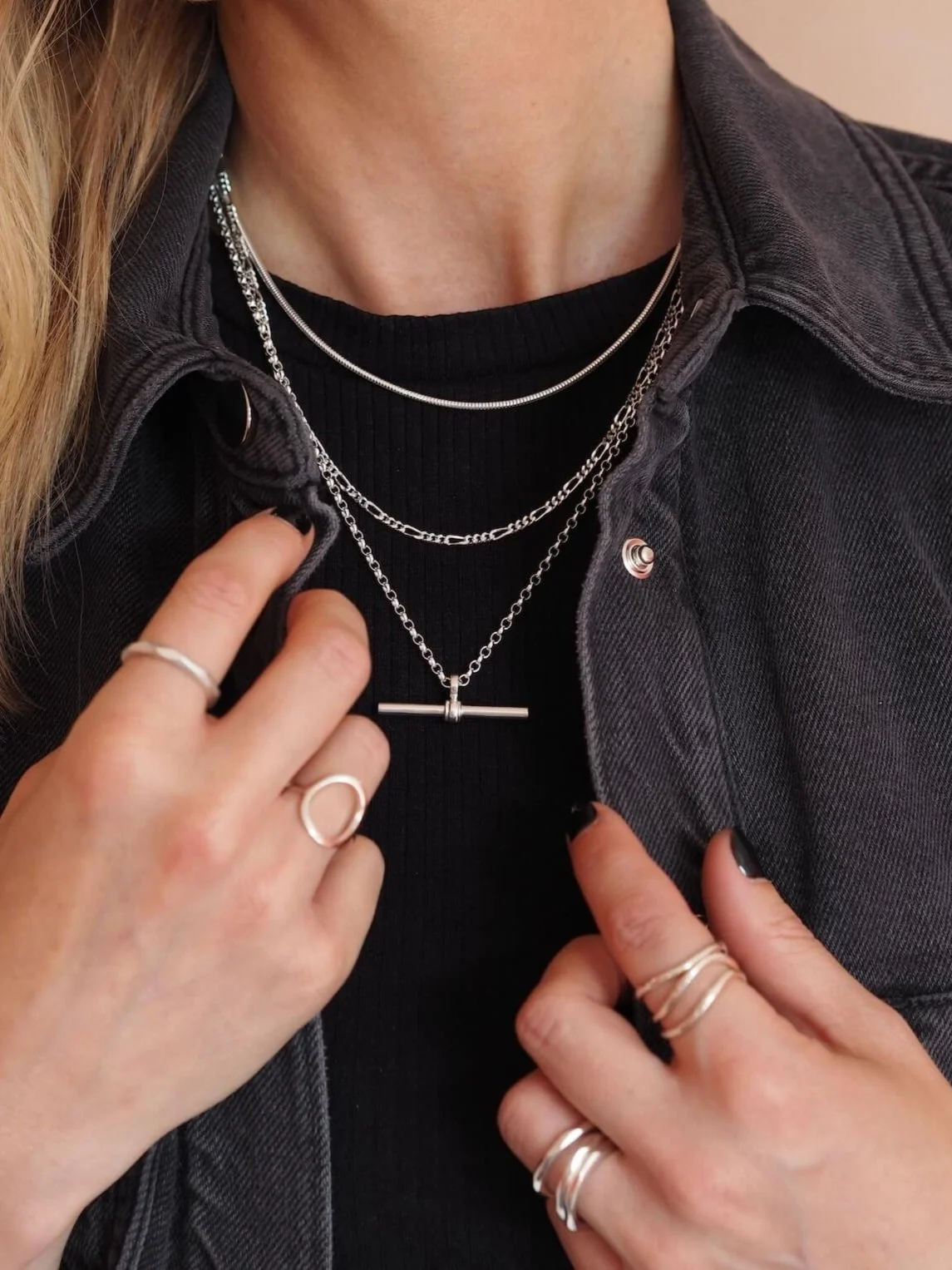 Sterling Silver Figaro Chain Necklace Modelled with classic T Bar pendant